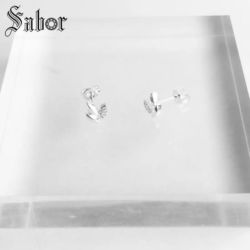 Серьги-гвоздики серебристого цвета с листьями лотоса серебристые ювелирные