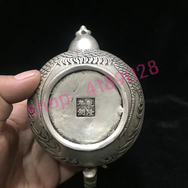 

Pure white copper, Qianlong year system, embossed Phoenix teapot / wine pot, home / living room decoration crafts, collectibles.