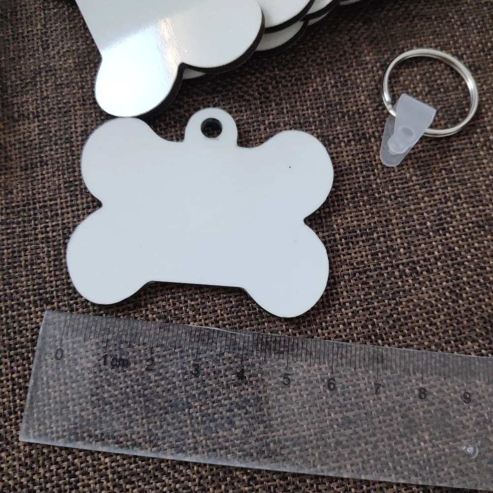 10 шт./лот, пустой сублимированный МДФ, Брелоки для ключей, прекрасный брелок в форме кости, сделай сам, подарочная печать, сублимационные чернила, две стороны, можно напечатать