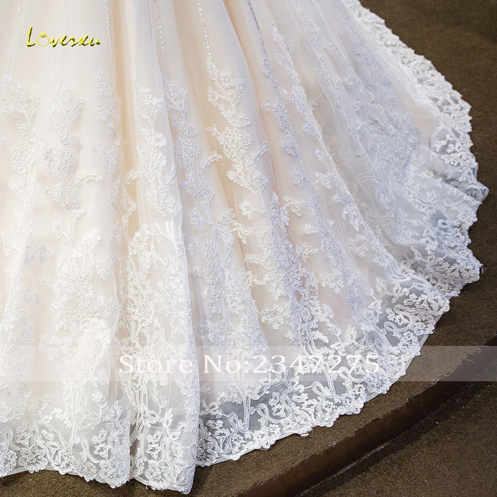 

Loverxu Vestido De Noiva Sexy Backless Lace Wedding Dresses 2019 Cap Sleeve Chapel Train Appliques Beaded A Line Bridal Gown