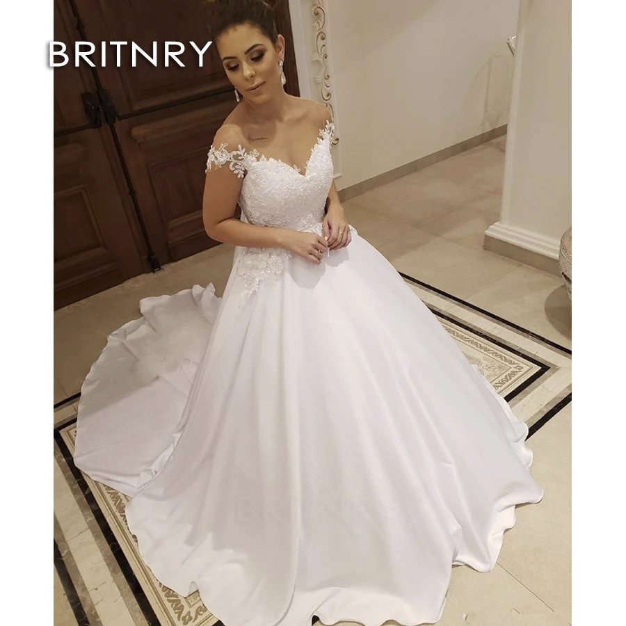 

BRITNRY Vestido de Noiva Modest Bateau Neckline Lace Statin Princess Illusio Wedding Dress 2020 New Cap Sleeves Bridal Gown
