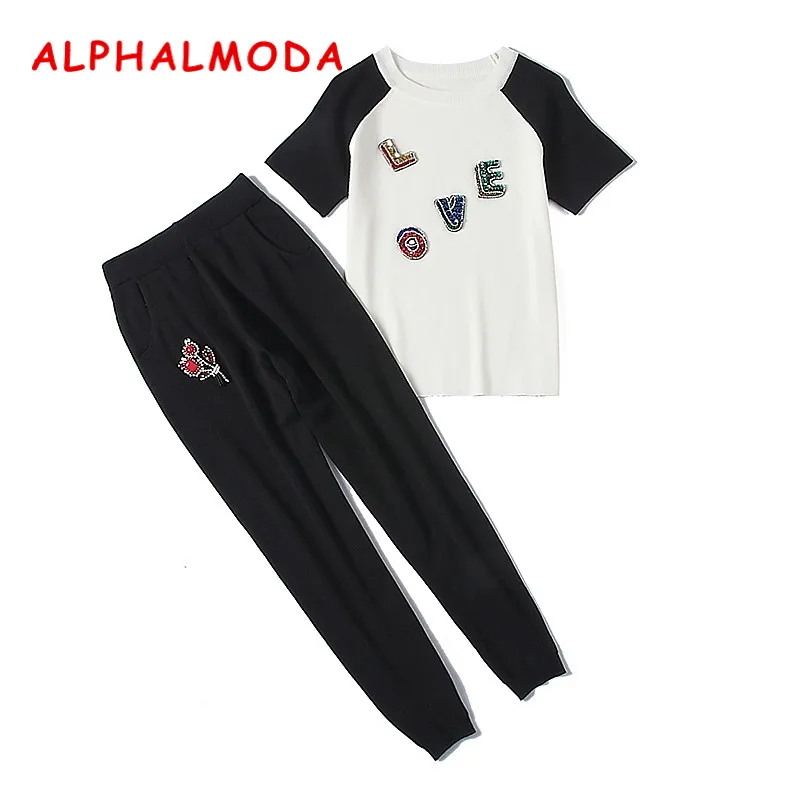 Женский вязаный костюм ALPHALMODA свитер с аппликацией букв + штаны цветами комплект