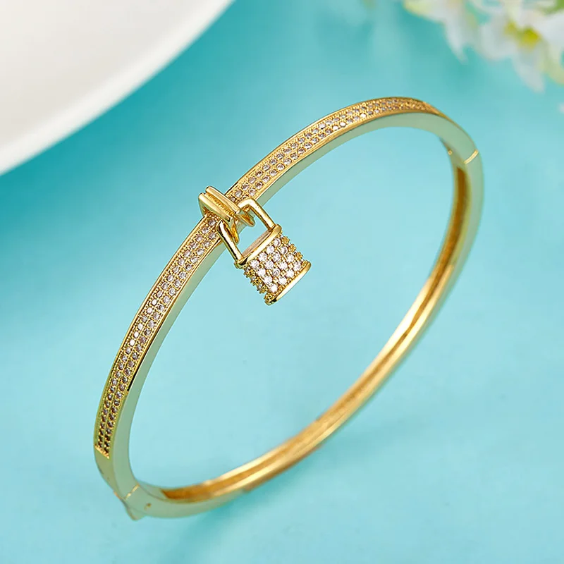 

Женский браслет из меди и золота, с фианитом