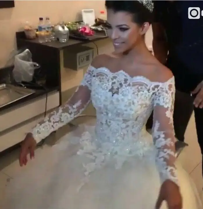 

Stunning See Through Lace ball gown wedding dresses long sleeves boat neck bridal gown fashion beaded vestidos de noiva