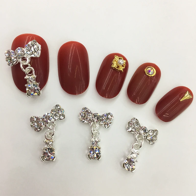 

LEAMX 10 PCS/bag Bow With Drop Nails Art Decorations 3D Bow Rhinestone Metal Nail Jewelry Accessory DIY Shining Tips Decor L438