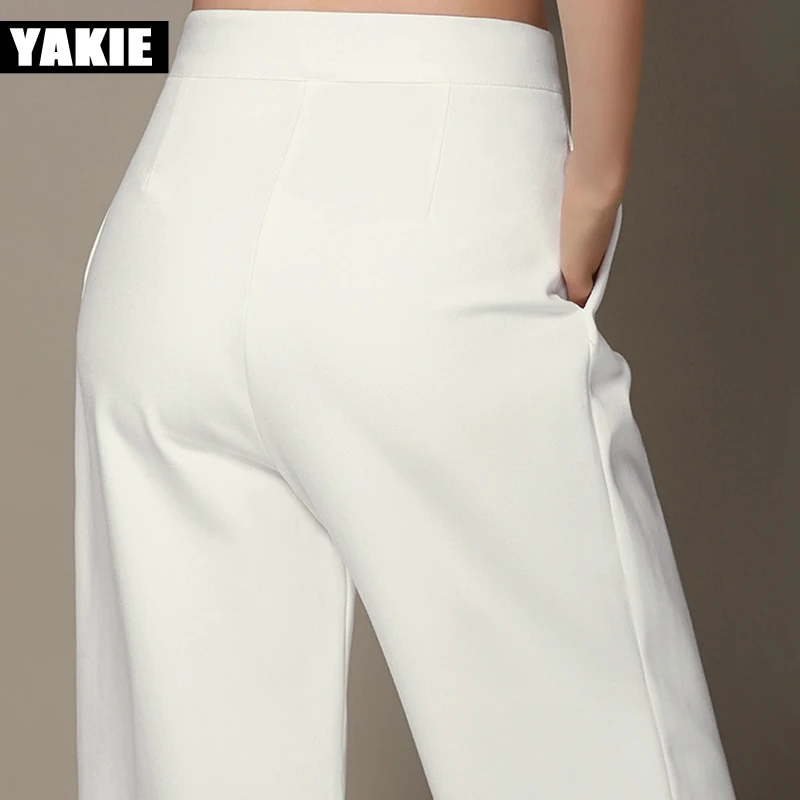 Брюки женские черные белые широкие с высокой эластичной талией в стиле пэчворк