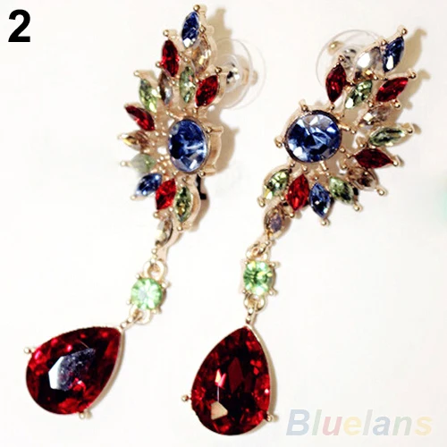 Женские серьги гвоздики в форме крыльев с симметричными кристаллами и стразами