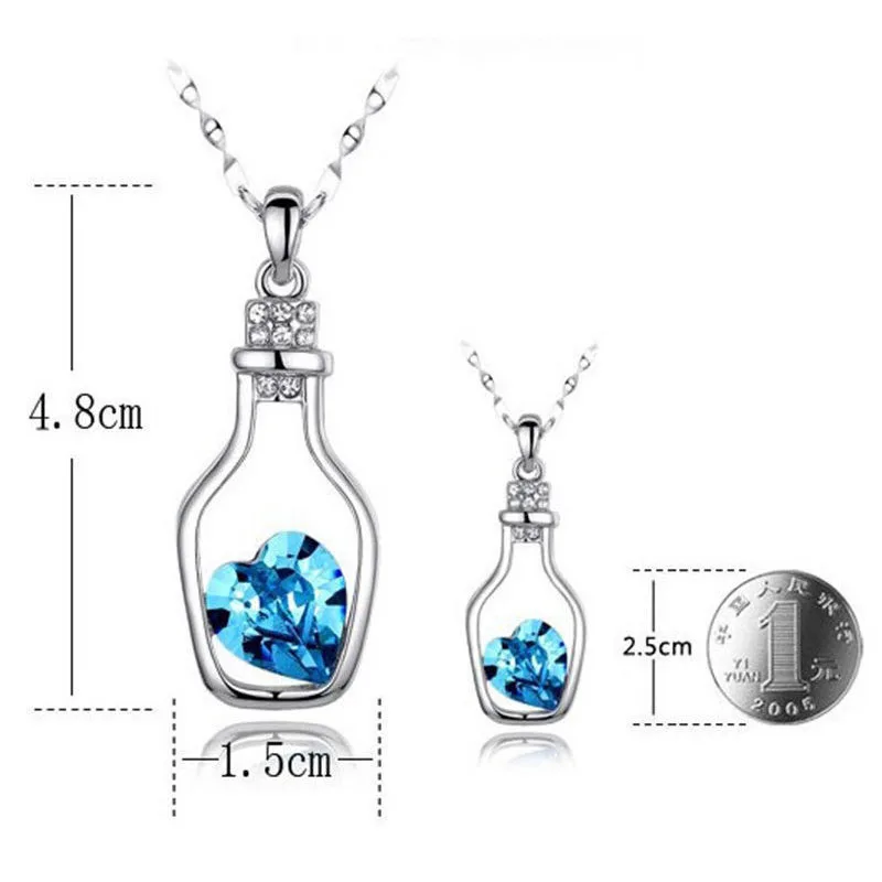 Цепочка серебряного цвета ожерелье с подвеской в виде хрустального сердца и