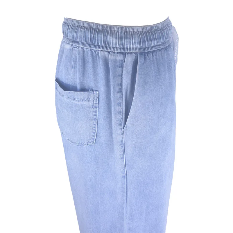 Женские брюки широкие светло-голубые джинсы повседневные с высокой талией