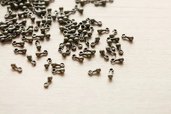 

1000 pcs of Antique Bronze end beads TearDrop Alloy End Piece - 7 mm