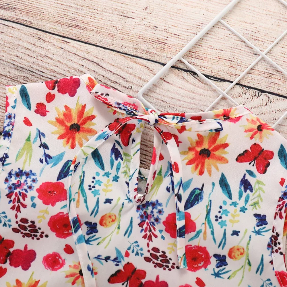 Летний однотонный топ без рукавов с рюшами и рукавами-крылышками шорты цветочным