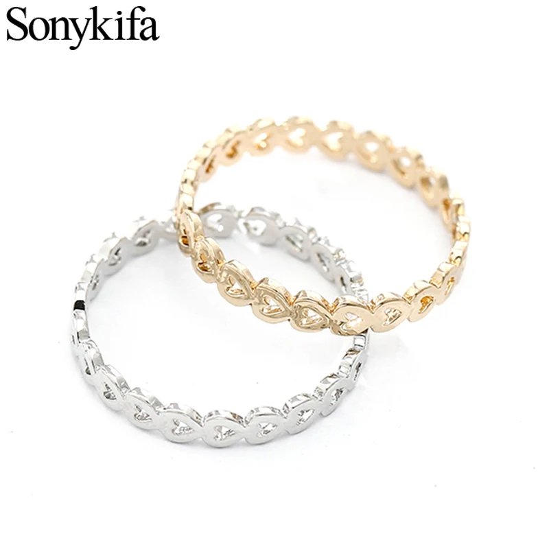 Женское кольцо Sonykifa серебряное с блестящим цирконием и сердечком на палец