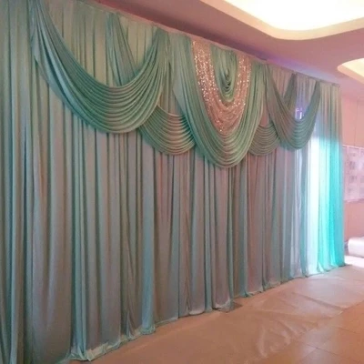 

Tiffany Wedding backdrop with shiny silver swags stage curtain decoration