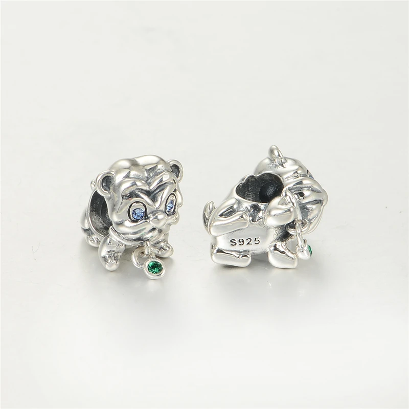 Женский браслет из серебра 100% пробы с тигровыми бусинами и голубыми глазами |