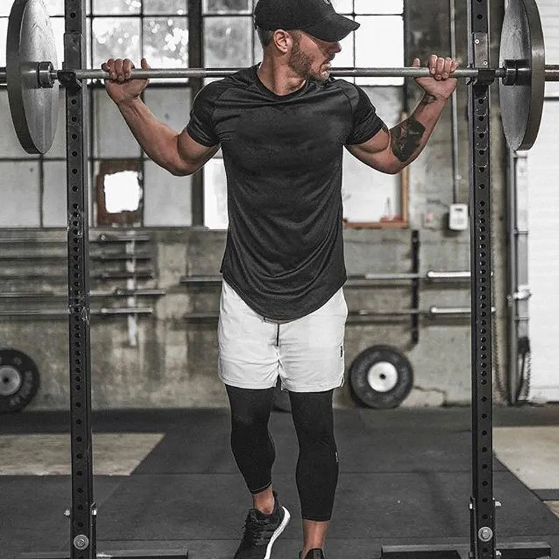 Новые мужские спортивные короткие брюки поддельные 2 девять минут на открытом