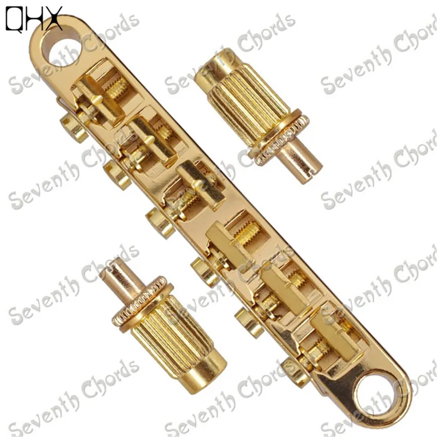 

A Set Tune-O-Matic 6 String Saddle Electric Guitar Bridge With Studs Gold Guitar Accessories Parts Musical Instrument