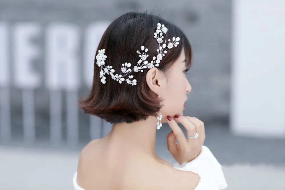 

New fashion female hair accessories by hand woven with pearl headdress fashion accessories.