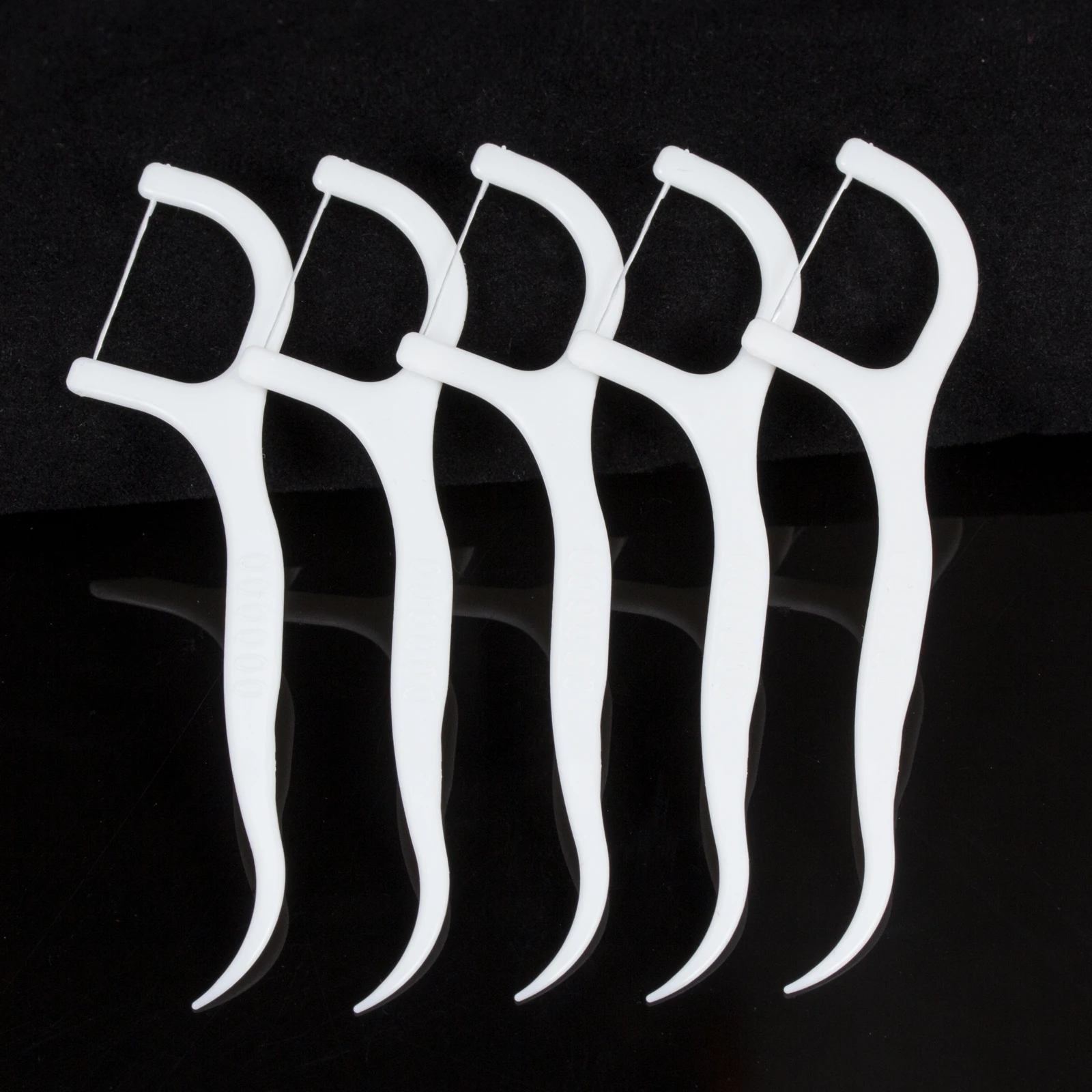 Одноразовая зубная нить Контейнер 50 шт./кор. нейлоновый полимерный проволочный