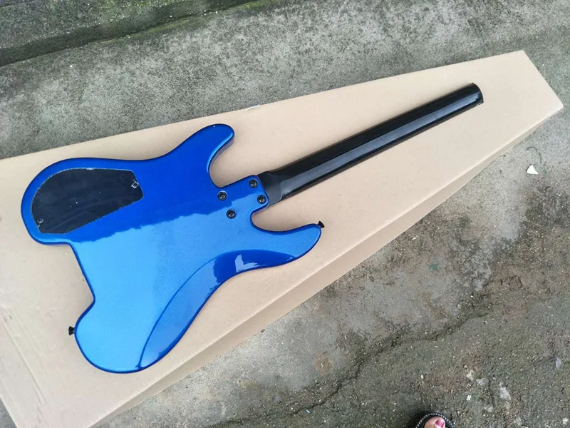 

The new blue headless electric guitar, rose wood finger plate, black pickup, customizable, free delivery.