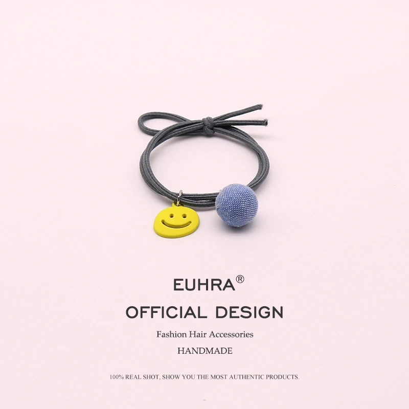 Эластичная полосатая повязка для волос EUHRA с улыбающимся лицом и маленьким