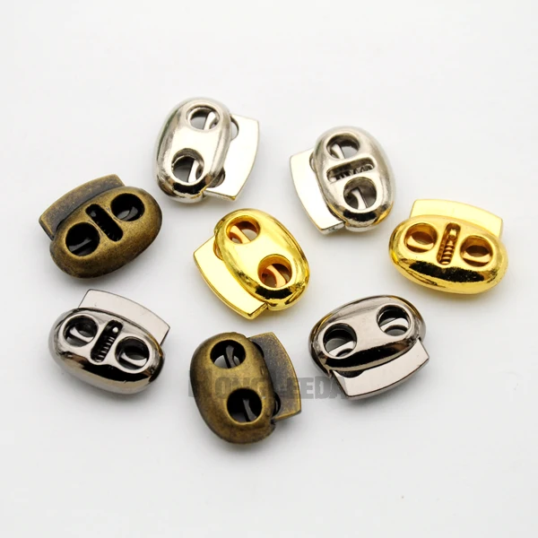 

DIY 30pcs/lot oval metal alloy stoppers toggle cord locks Drawstring two hole nickle/Black/gold/bronze for 4mm bungee STP-007