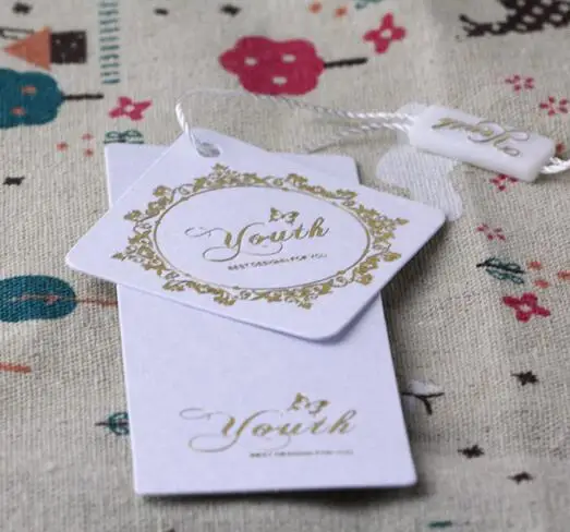 

customized die cut letterpress gold stamping tags for cloth printed hang tag labels for clothes/clothing printed paper swing tag