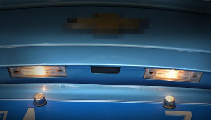 Для Cruze Chevrolet задняя подсветка номерного знака с кнопкой переключения багажника |
