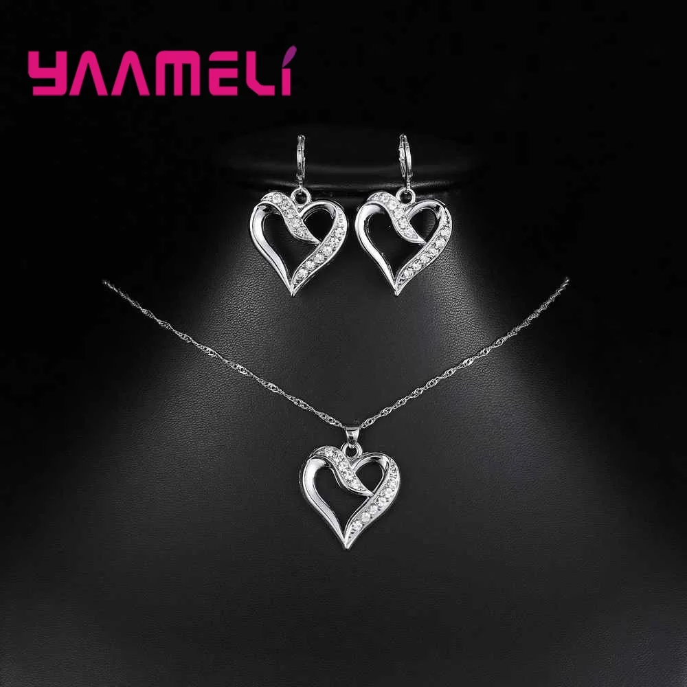 Классический женский набор серебряных ювелирных украшений с круглым цирконом