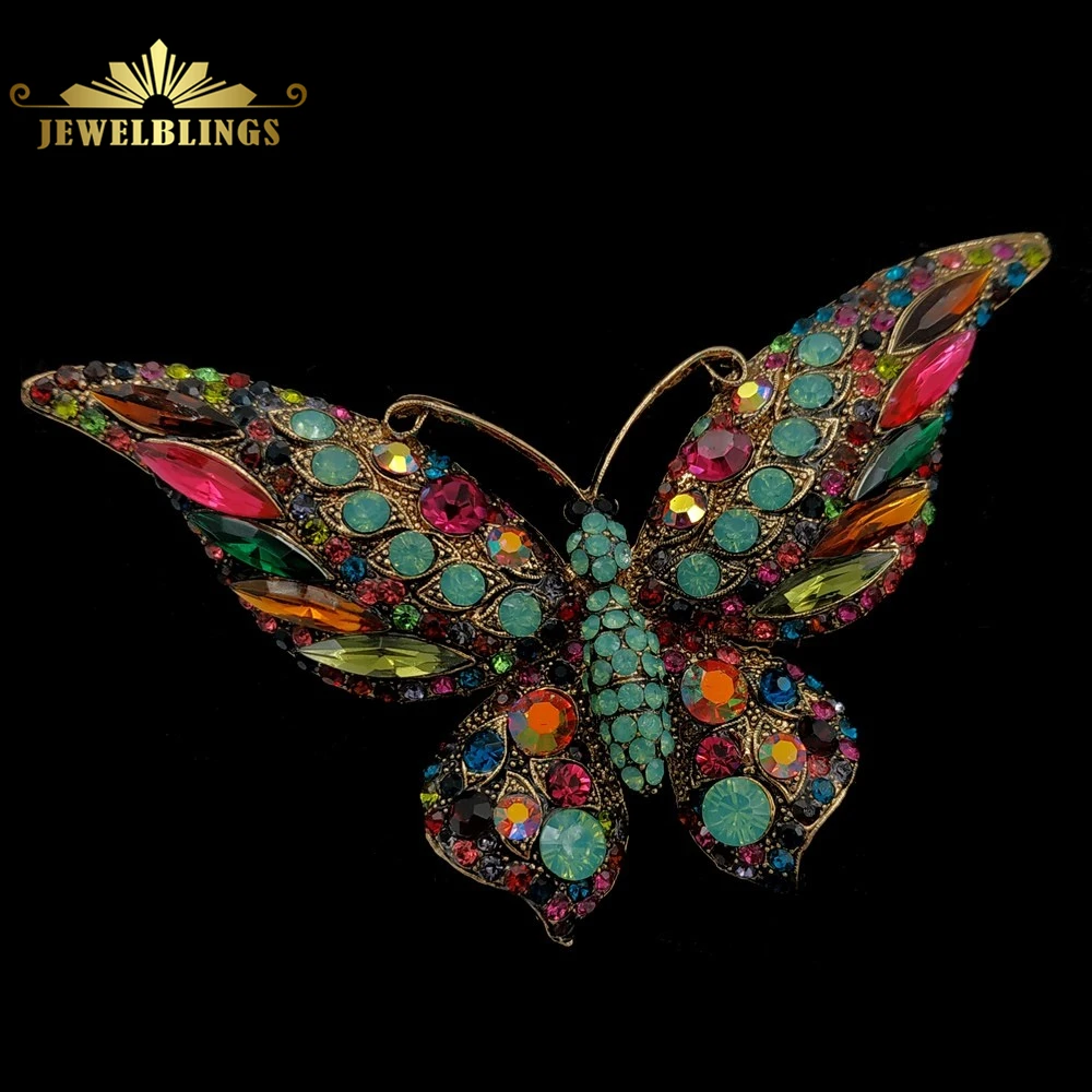 Большая брошь в форме бабочки с кристаллами золотистого цвета ярко-зеленого