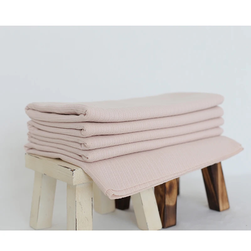 Ребенок позирует ткань одеяло для новорожденных трикотажные бутафория фото