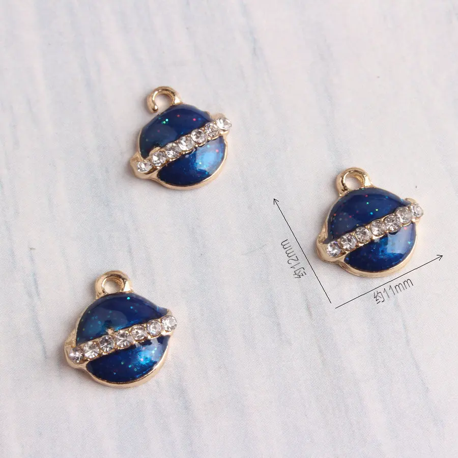 

Wholesale 50pcs 12*11MM Glitter Enamel Alloy Crystal Saturn Charms DIY Ornaments Ornament Accessories Metal Oil Drop Charm