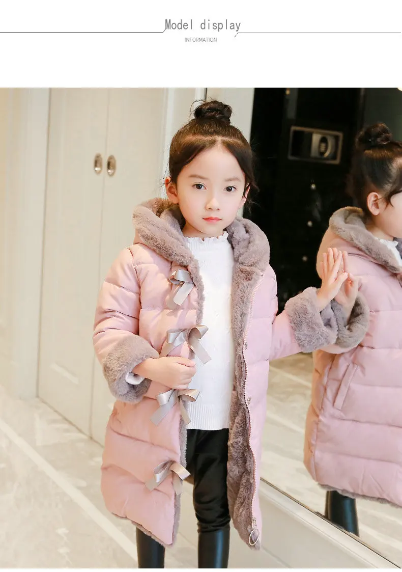 

A long winter children's coat with children's wear and cotton padded jacket