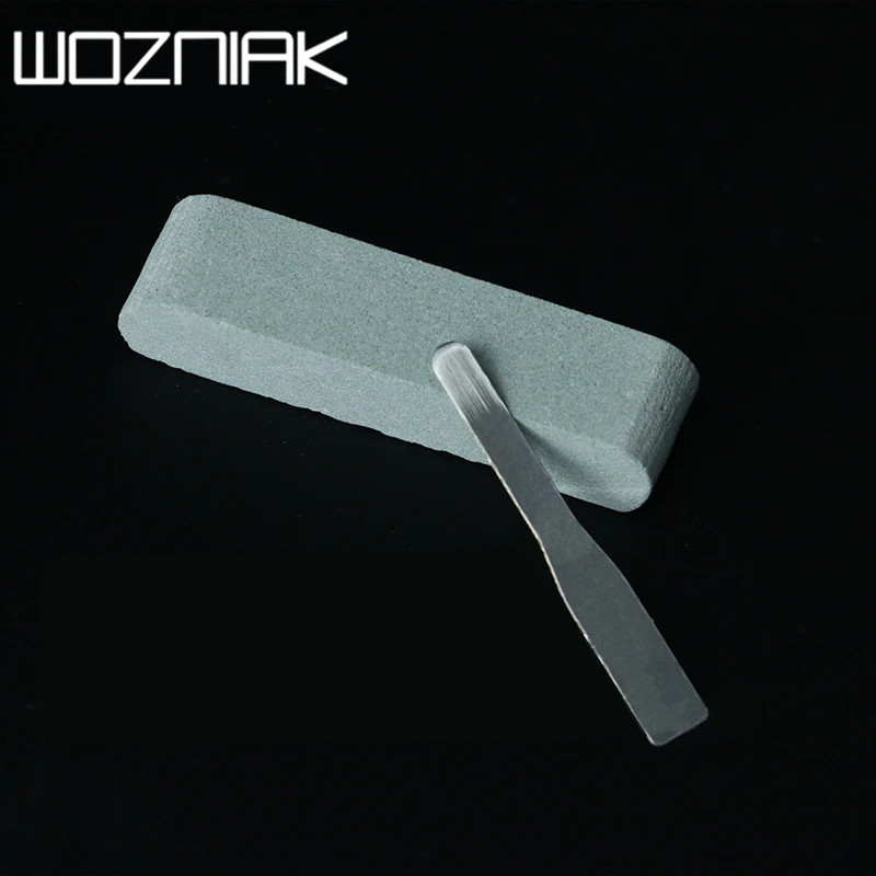 Мобильный телефон ремонт процессора лезвия заточки железа, а также пластиковые пинцеты и тонкая точила камень.