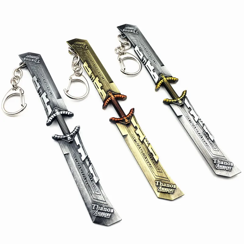 

20PCS/ LOT Wholesale Movie Weapons Double-edged Sword Glove Gauntlet Keychain Metal Keyring Blister Card Package