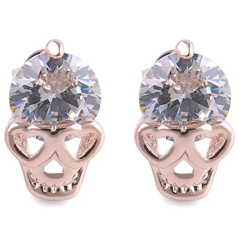 Модные женские серьги гвоздики в виде черепа из розового золота с кристаллами