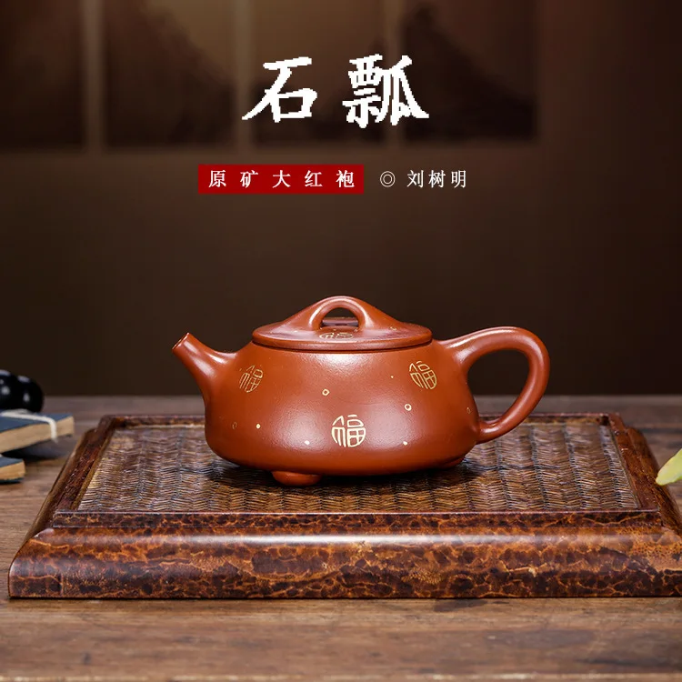 Керамический чайник ярко красный халат отслеживает золотой дизайн Jingzhou Shihuo Liu
