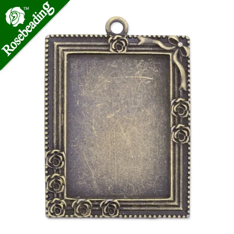

35x49mm Antique Bronze Plated Pendant trays,inner 25x35mm,fit 25x35mm rectangle glass cabochon,depth 3.5mm,sold 20pcs/lot-C3505