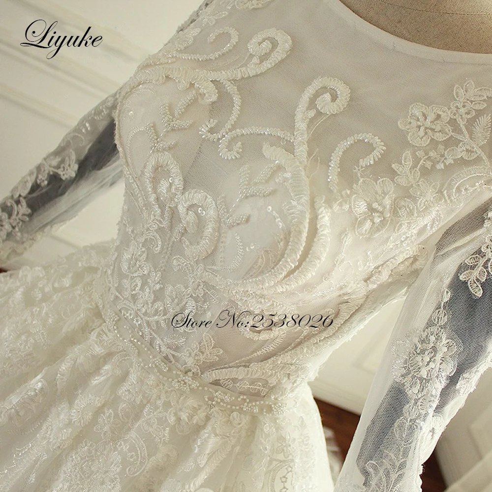 

Liyuke Full Sleeve A Line Wedding Dress Custom Made Of Scoop Neckline With Symmetrical Beads Wedding Gown