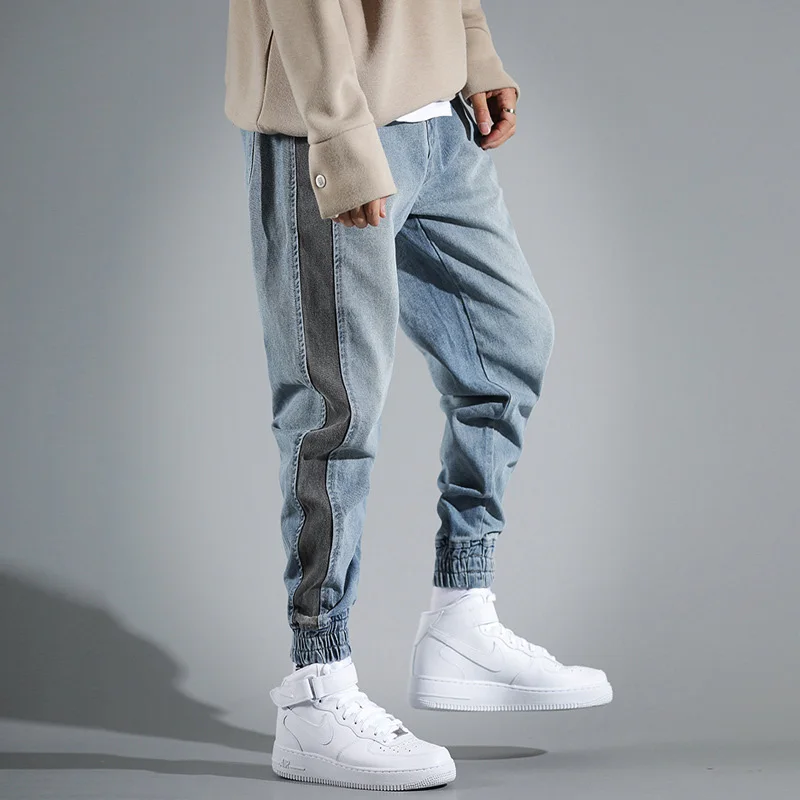 

Newly Fashion Streetwear Men Jeans Black Stripe Spliced Designer Harem Jeans Men Denim Cargo Pants Youth Hip Hop Joggers Jeans