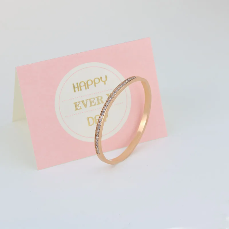 Женский браслет из нержавеющей стали с фианитом золотистый кристаллами