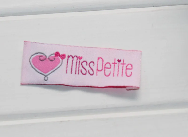 Индивидуальные этикетки для одежды в центральном сложении индивидуальные