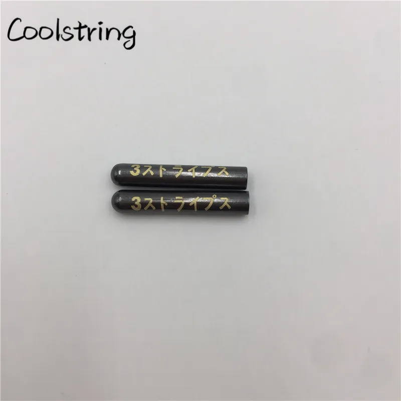Coolstring 4 шт./1 комплект блестящие бесшовные толстовки шнурки металлические Aglets лазерные японские буквы Одежда DIY шнурки советы - Цвет: 483	Gun black logo