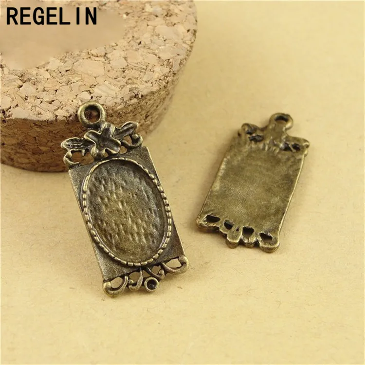 

REGELIN vintage alloy antique bronze oval pendant bezels tray connector 20pcs inner 14*10 MM setting size Jewelry Accessories
