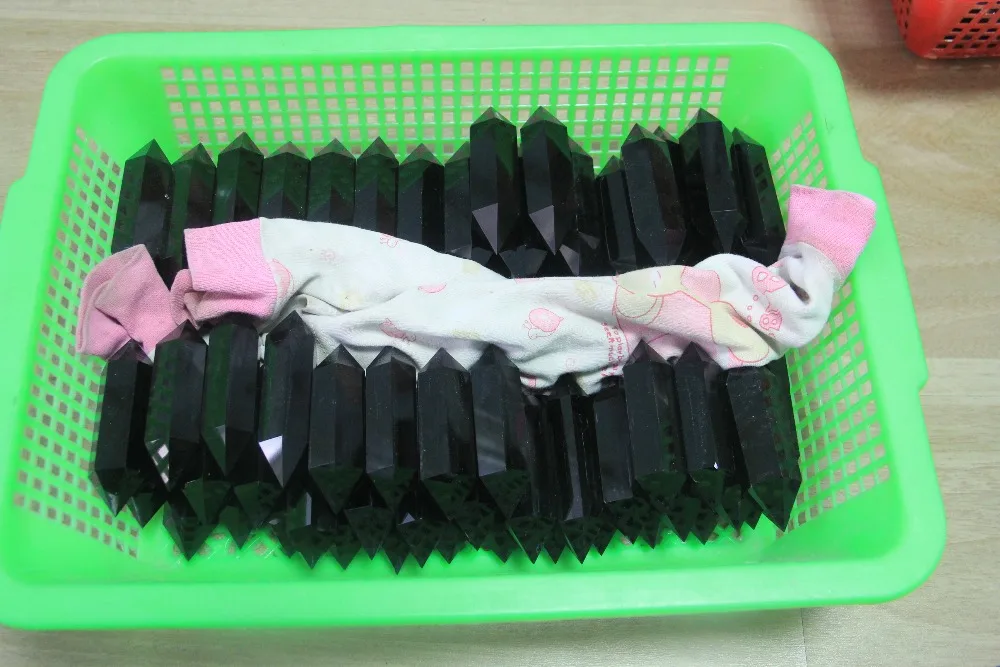 

1 kg natural obsidian jadeite-bearing crystal wand to heal