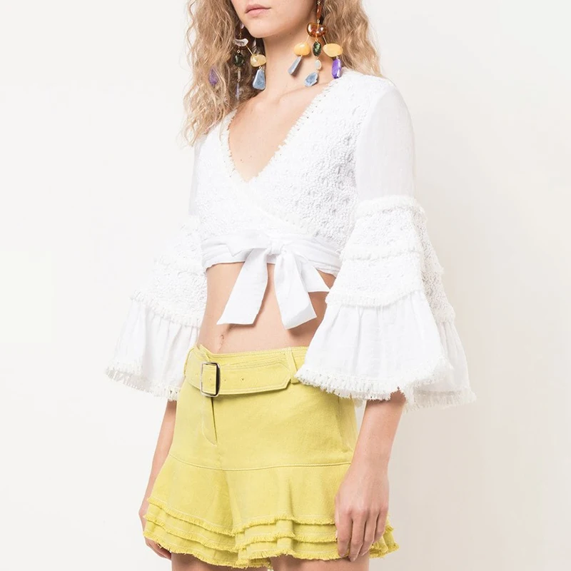TWOTWINSTYLE Элегантный кисточкой лоскутное женский костюм V образным вырезом расклешенный бандажный укороченный топ Высокая талия узкая юбка средней длины комплект из двух предметов женский
