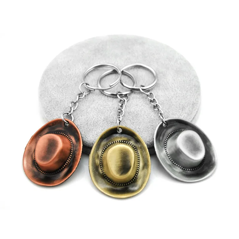 

Original New Brand Vintage Cowboy Hat Key Chain Men Trinket Retro Gold Metal Car Keychain Key Ring Male Jewelry Souvenirs Gift