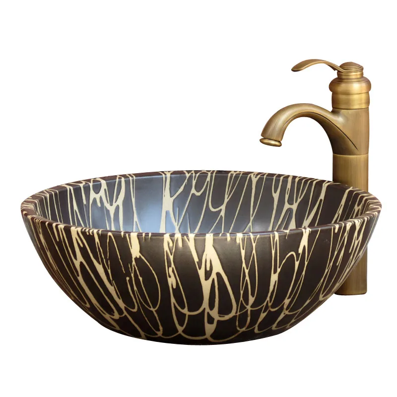 Средиземноморский круглый стол черный умывальник ванная комната керамический