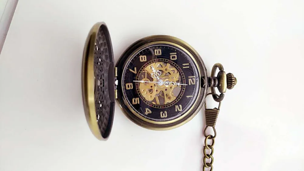 

Bronze antiques Hollow men and woman gift mechanical cowboy chain pocket watch