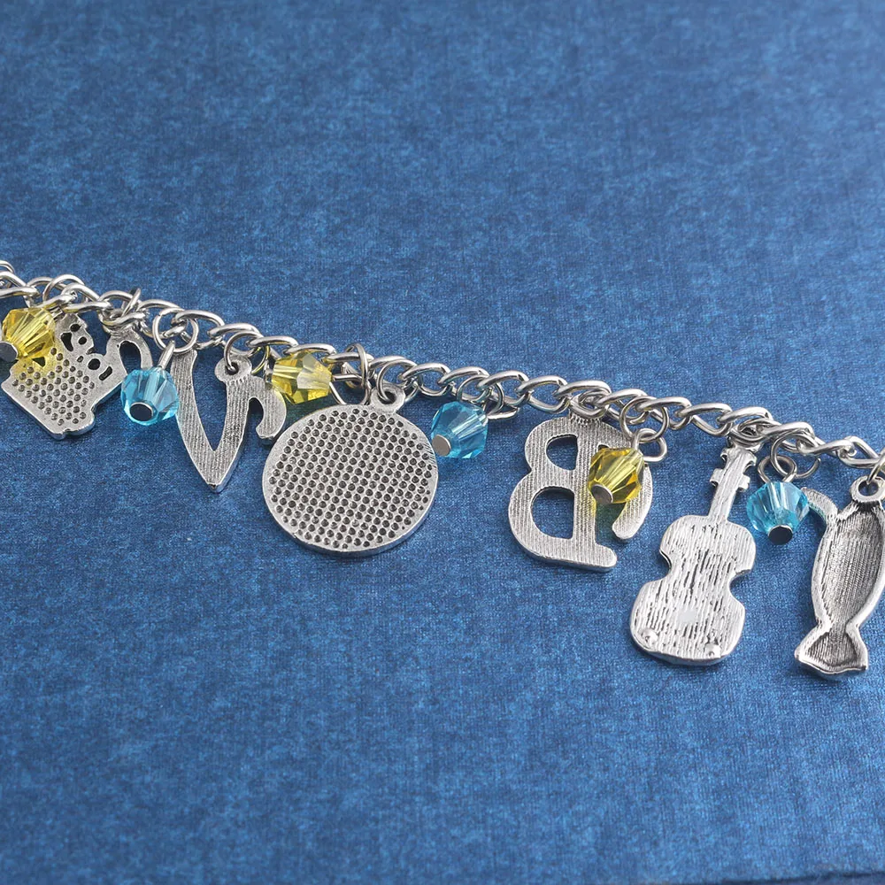 Женский браслет с кулоном в виде змеиной гитары и ружья ривердейла|Цепочки