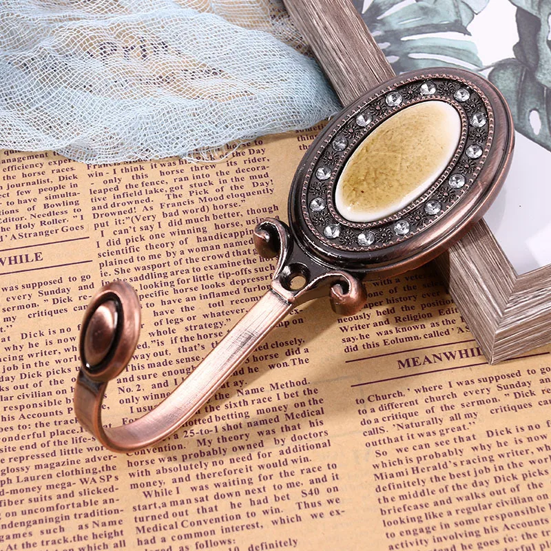 

Hanging zinc alloy mirror hook curtain wall hook curtain accessories wholesale
